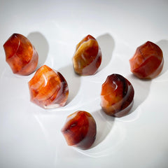 Bulk View of Polished Fire Carnelian Sculptures