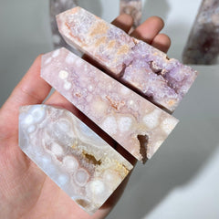Close-up of natural pink flower agate crystal with druzy patterns