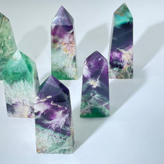 Green and purple fluorite with feather-like inclusions