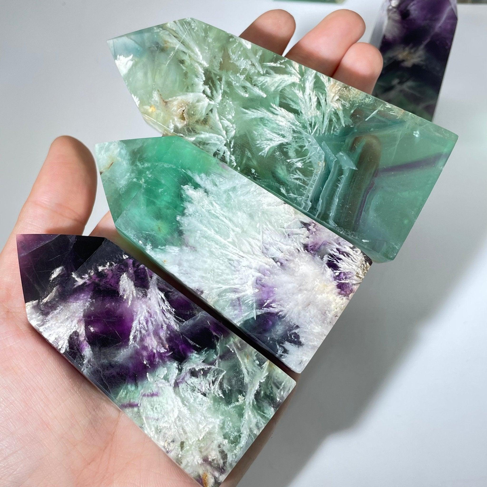 Fluorite tower size reference held in hand